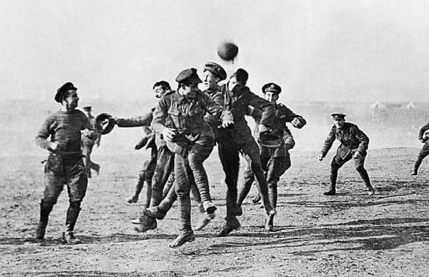 1914: Christmas Truce in WW1: British and German troops play football instead of fighting