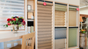 Variety of different window blinds options on a wall